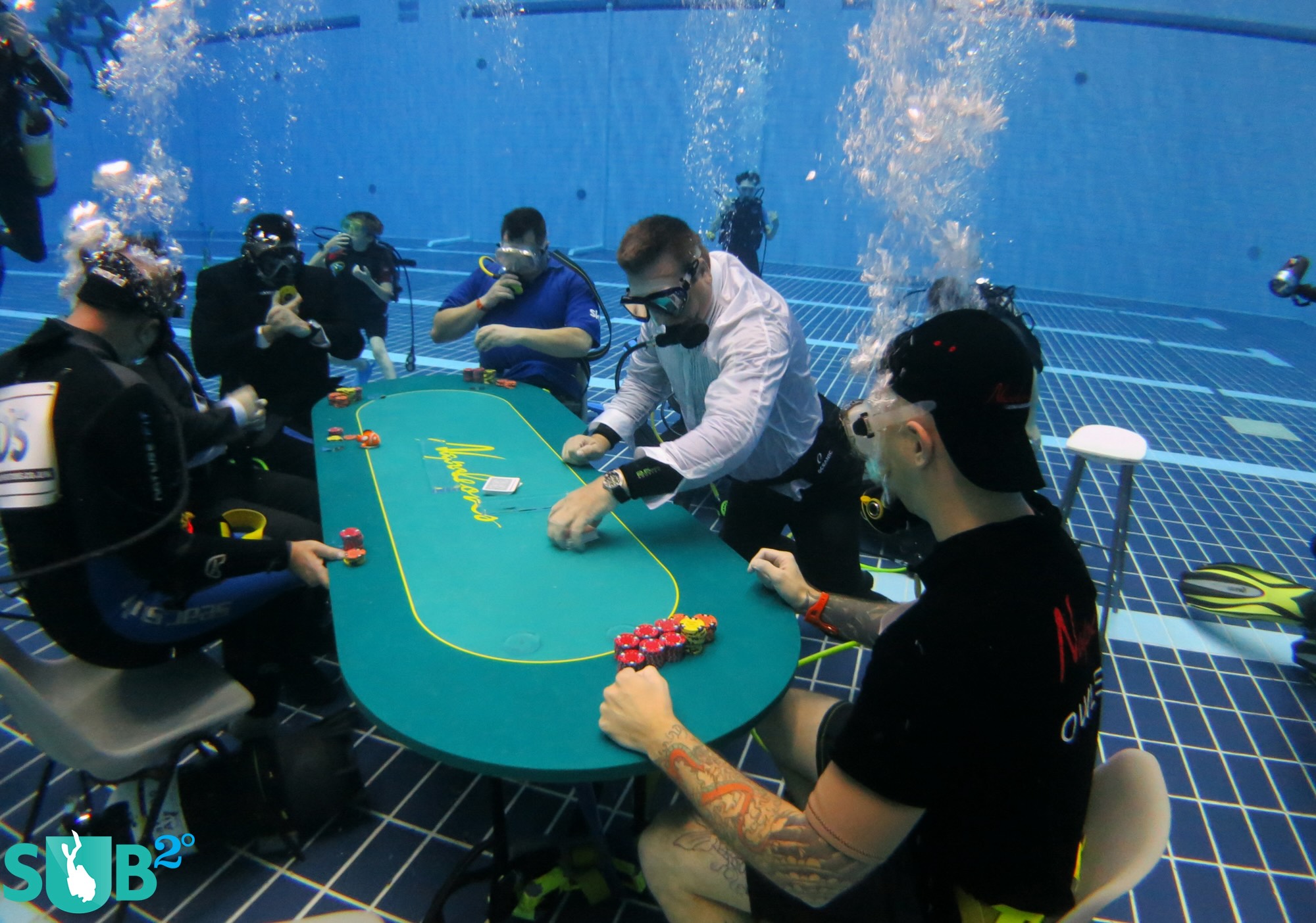 Play poker underwater.